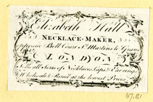 Eine alte Visitenkarte mit einem Bild eines Schmuckherstellers und einem Text über dessen Dienstleistungen.